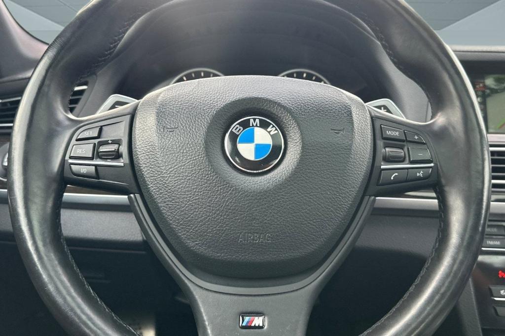 used 2013 BMW 750 car, priced at $8,996
