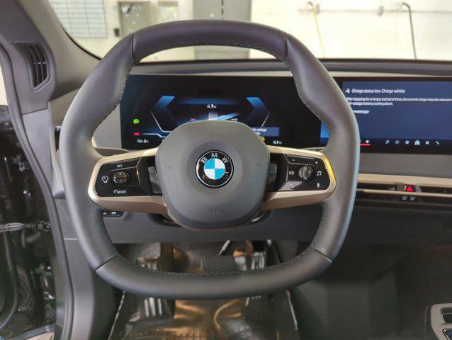 new 2026 BMW iX car, priced at $83,520