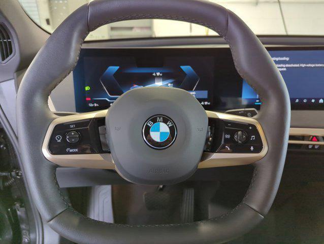 new 2026 BMW iX car, priced at $94,795