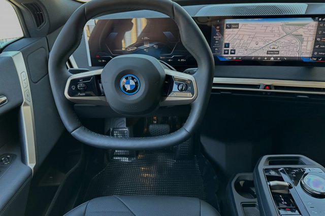 new 2025 BMW iX car, priced at $89,305