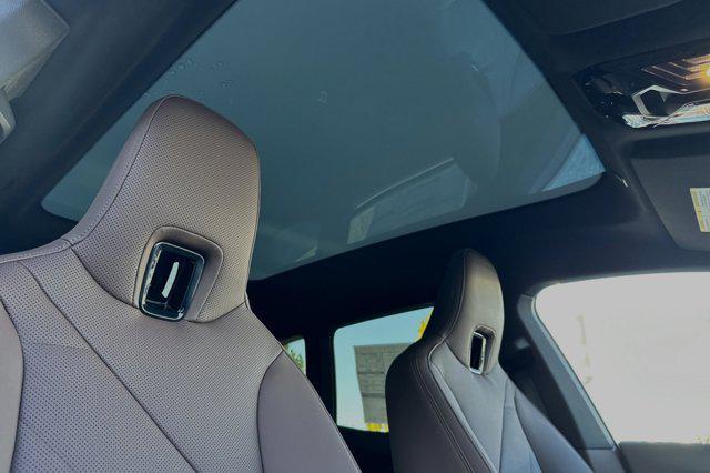 new 2025 BMW iX car, priced at $98,095