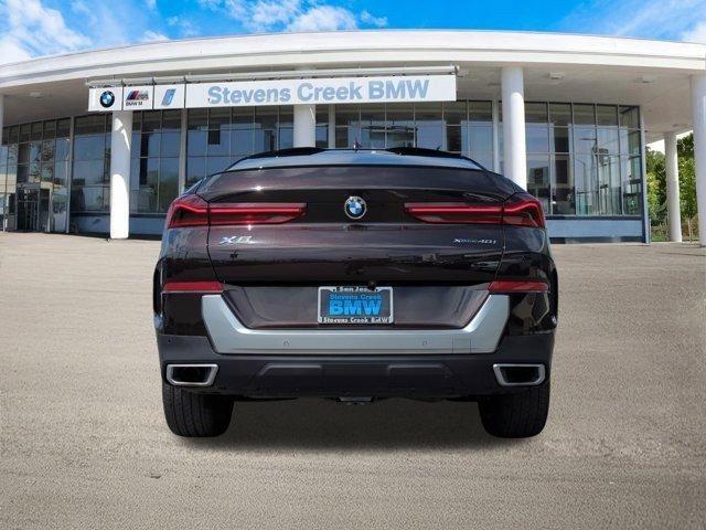 used 2022 BMW X6 car, priced at $52,496