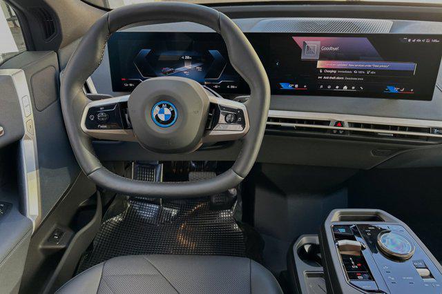 new 2025 BMW iX car, priced at $90,455