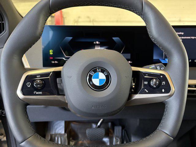 new 2026 BMW iX car, priced at $94,475
