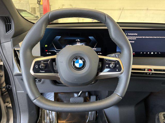 new 2026 BMW iX car, priced at $94,475