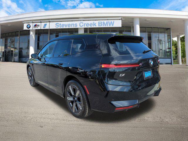 new 2026 BMW iX car, priced at $98,175
