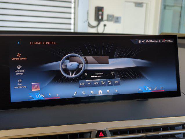 new 2026 BMW iX car, priced at $81,545