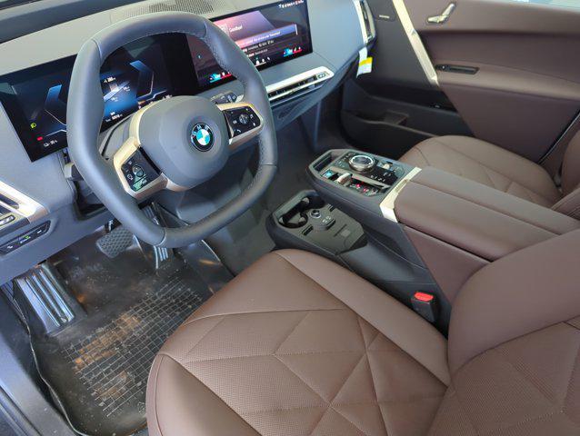 new 2026 BMW iX car, priced at $81,545