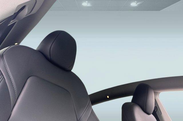 used 2025 Tesla Model Y car, priced at $38,999