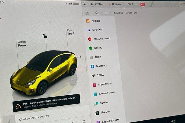 used 2025 Tesla Model Y car, priced at $38,999