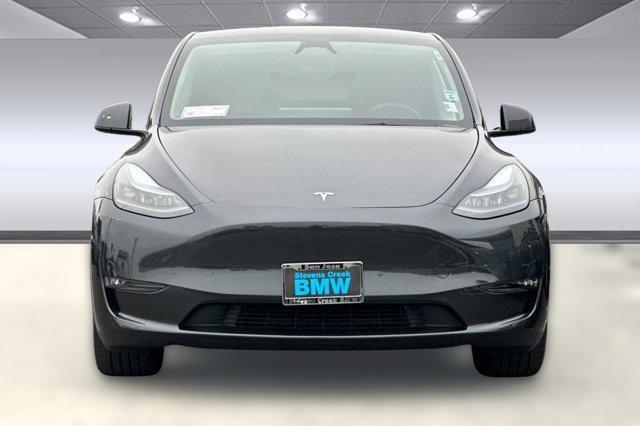 used 2025 Tesla Model Y car, priced at $38,999