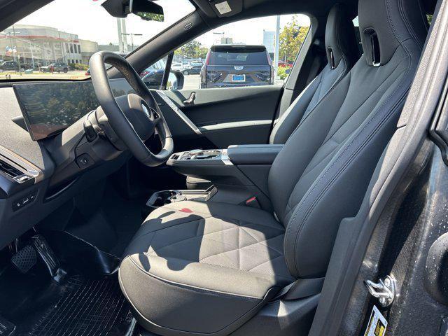 new 2026 BMW iX car, priced at $83,495