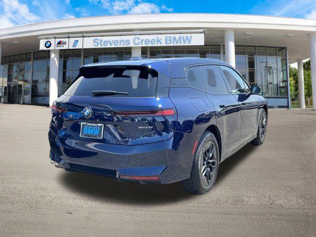 new 2026 BMW iX car, priced at $83,495