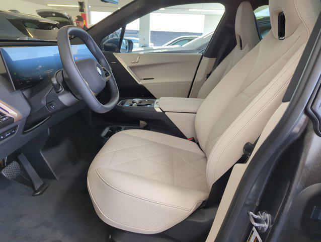 new 2026 BMW iX car, priced at $94,920