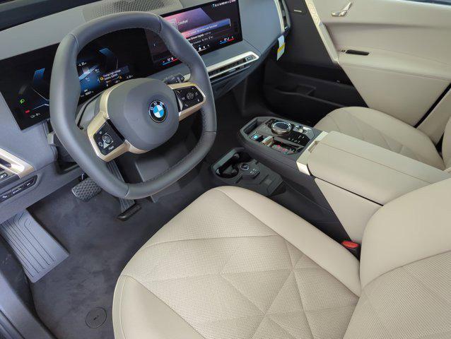 new 2026 BMW iX car, priced at $94,920