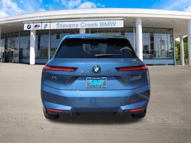 new 2026 BMW iX car, priced at $94,920