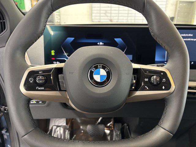 new 2026 BMW iX car, priced at $94,295