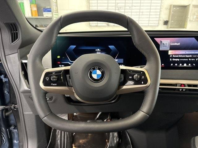 new 2026 BMW iX car, priced at $94,295