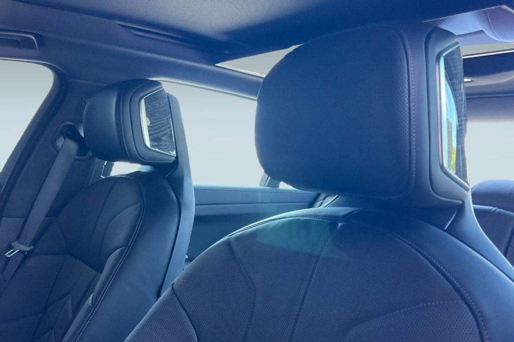new 2025 BMW 740 car, priced at $110,325