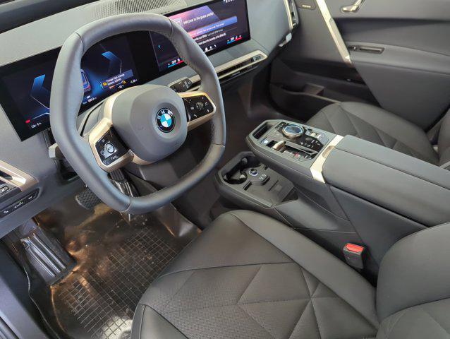 new 2026 BMW iX car, priced at $99,495
