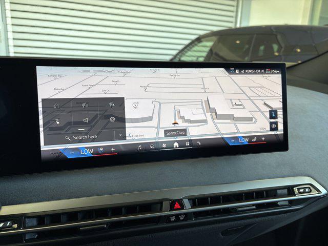 new 2026 BMW iX car, priced at $104,325