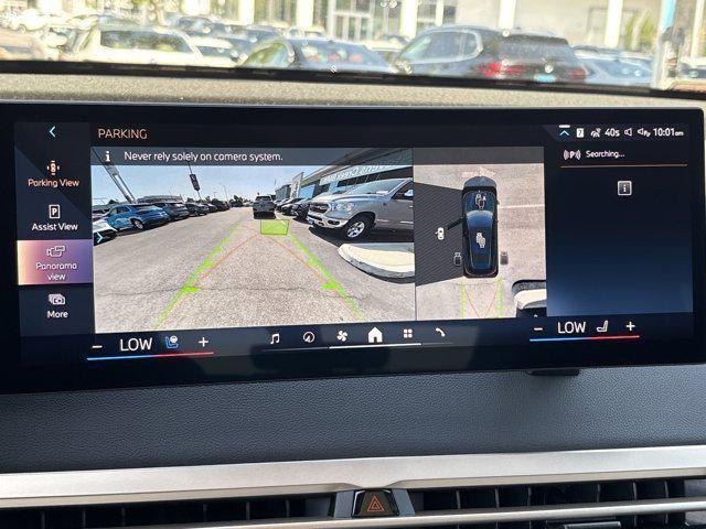 new 2026 BMW iX car, priced at $94,795