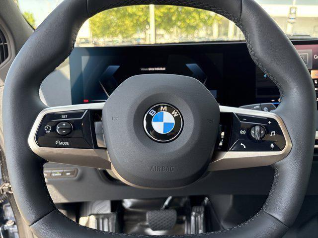new 2026 BMW iX car, priced at $94,795
