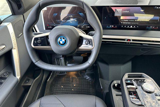 new 2025 BMW iX car, priced at $93,435