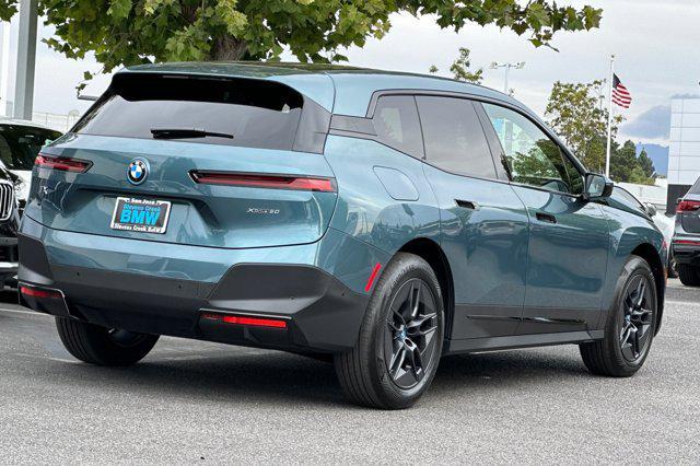 used 2025 BMW iX car, priced at $88,805