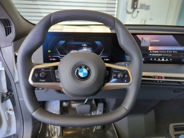 new 2026 BMW iX car, priced at $96,695