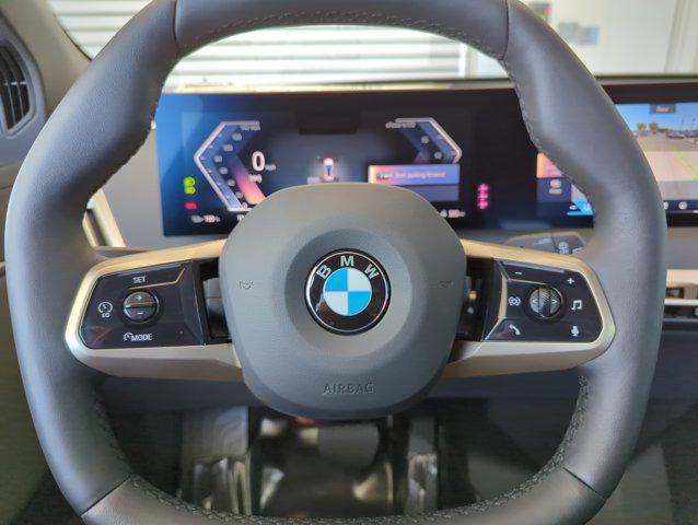 new 2026 BMW iX car, priced at $96,695