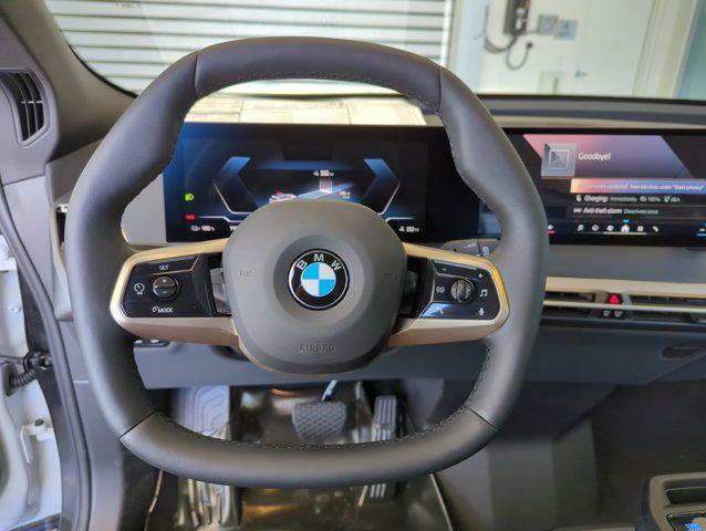 new 2026 BMW iX car, priced at $96,695