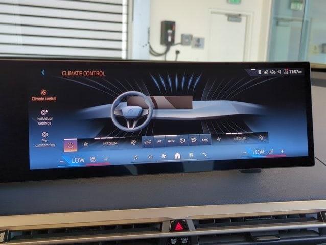 new 2026 BMW iX car, priced at $96,695