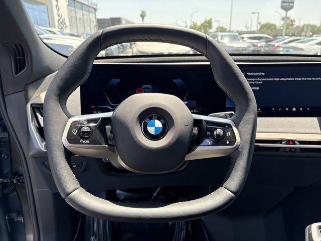 new 2026 BMW iX car, priced at $83,495