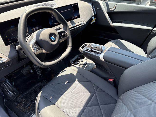 new 2026 BMW iX car, priced at $83,495
