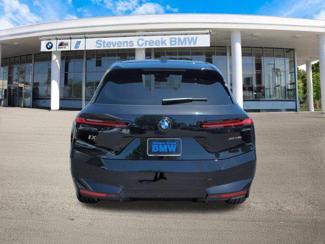 new 2026 BMW iX car, priced at $81,545