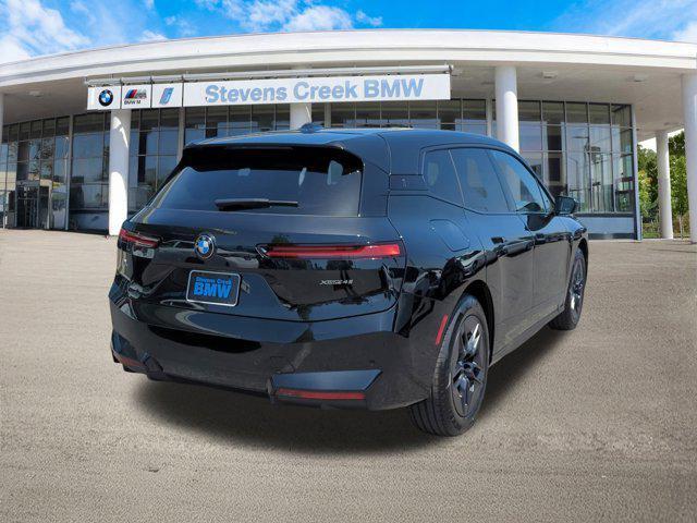 new 2026 BMW iX car, priced at $81,545