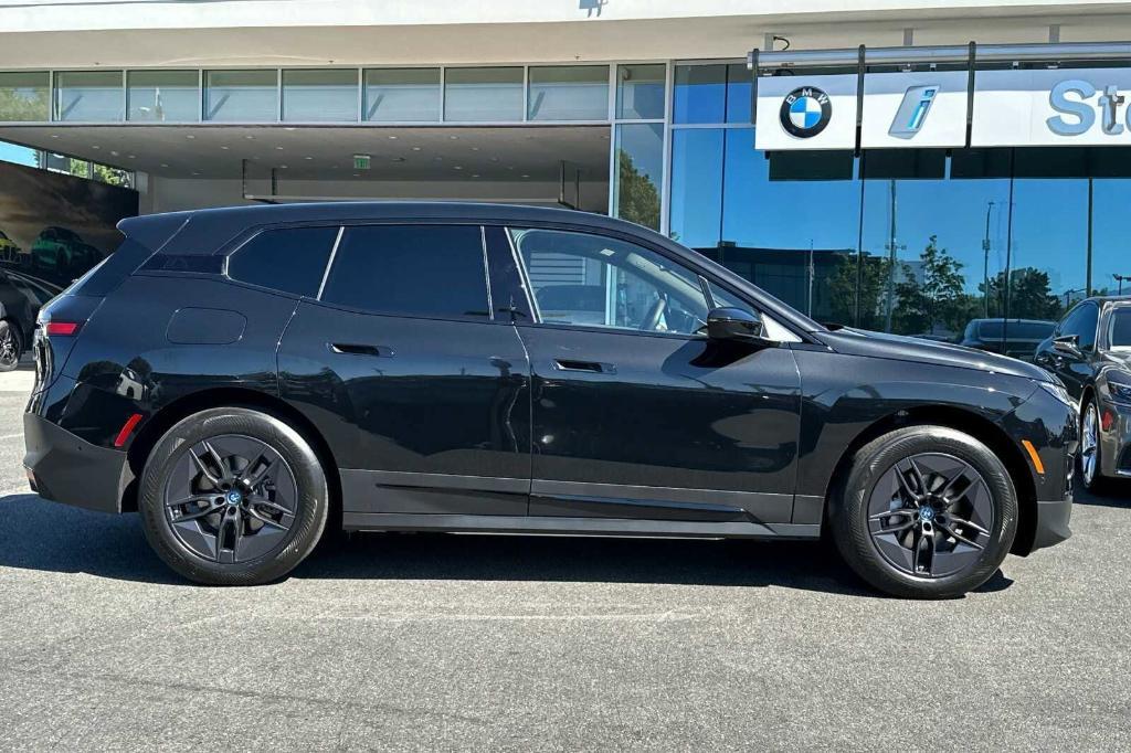 new 2025 BMW iX car, priced at $88,805