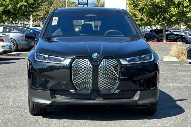 new 2025 BMW iX car, priced at $88,805