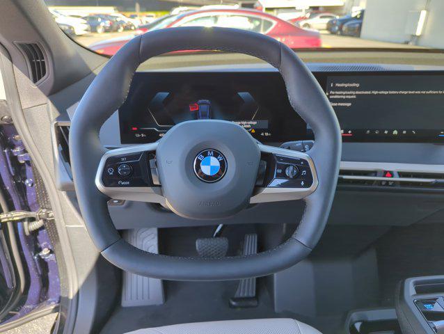 new 2026 BMW iX car, priced at $83,120
