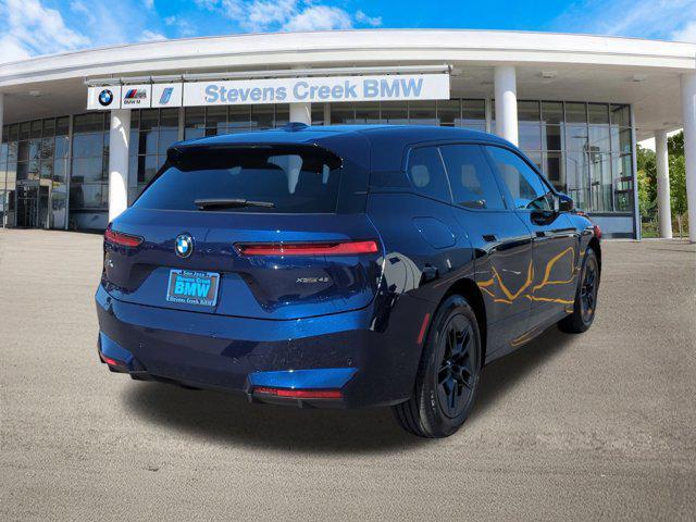 new 2026 BMW iX car, priced at $83,120