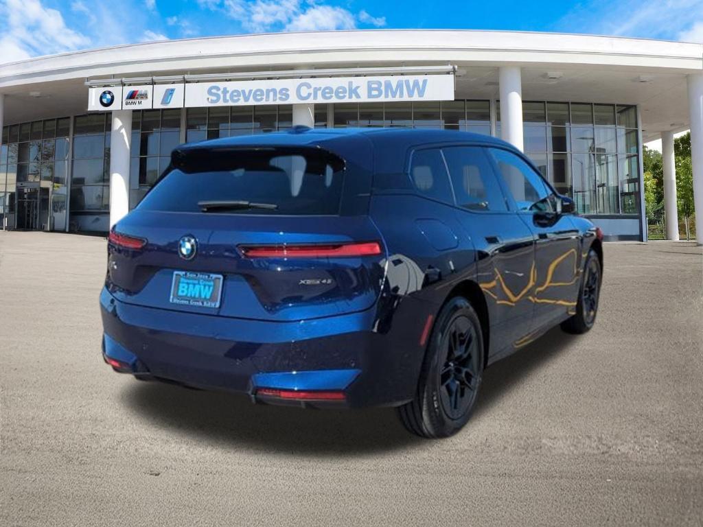 new 2026 BMW iX car, priced at $83,120