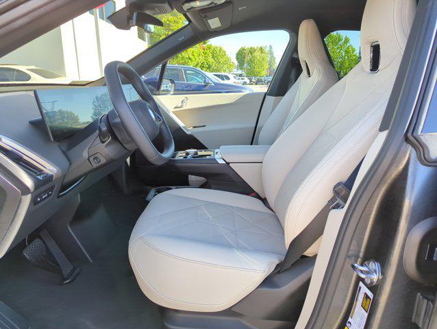 new 2026 BMW iX car, priced at $83,120