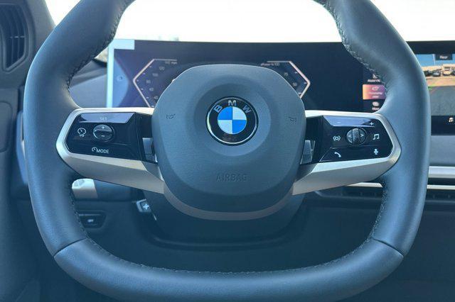 new 2026 BMW iX car, priced at $84,870