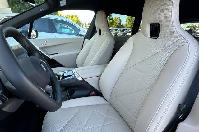 new 2026 BMW iX car, priced at $84,870