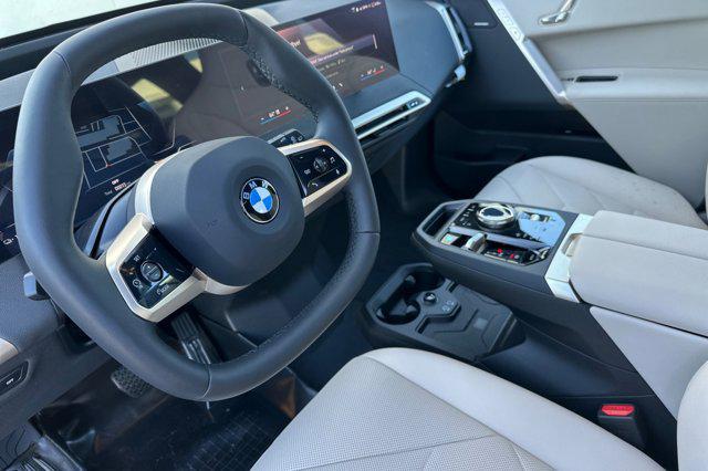 new 2026 BMW iX car, priced at $84,870