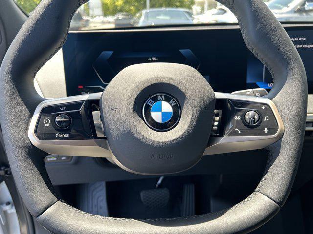 new 2026 BMW iX car, priced at $94,295