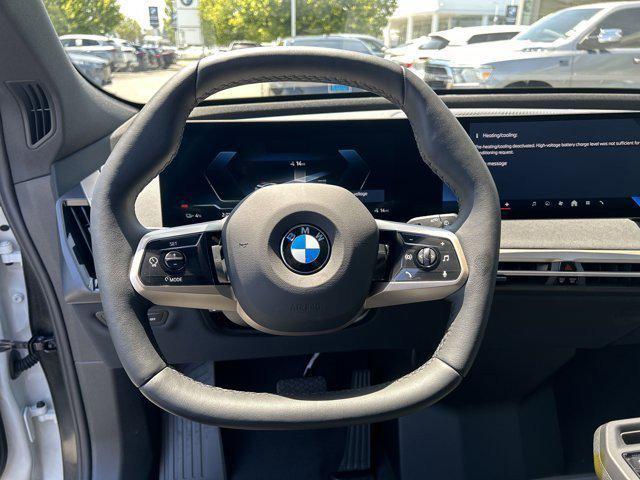new 2026 BMW iX car, priced at $94,295