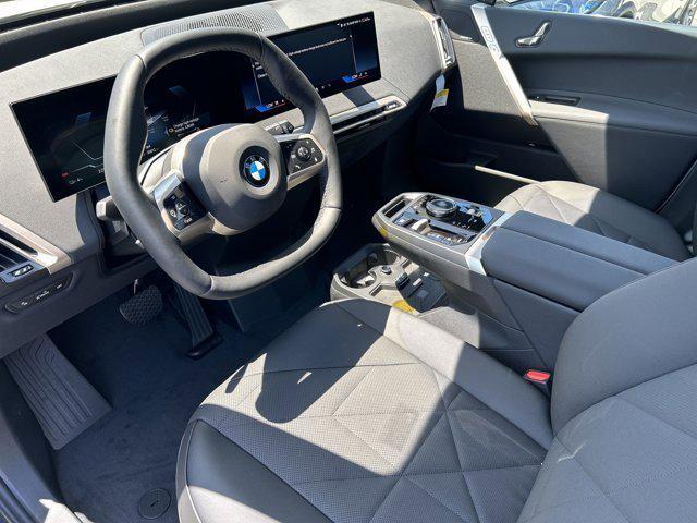 new 2026 BMW iX car, priced at $94,295