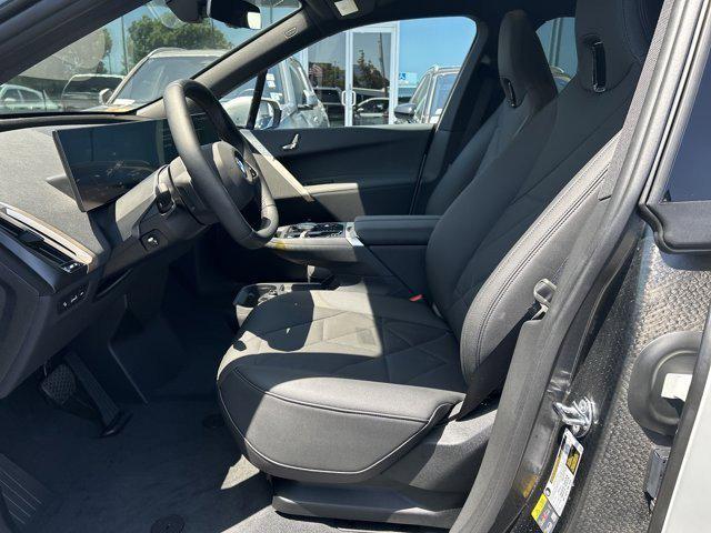 new 2026 BMW iX car, priced at $94,295